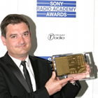 www.radioiloveit.com | talkSPORT PD Moz Dee with his Sony Radio Academy Award for Station Programmer of the Year 2011 (photo: talkSPORT)
